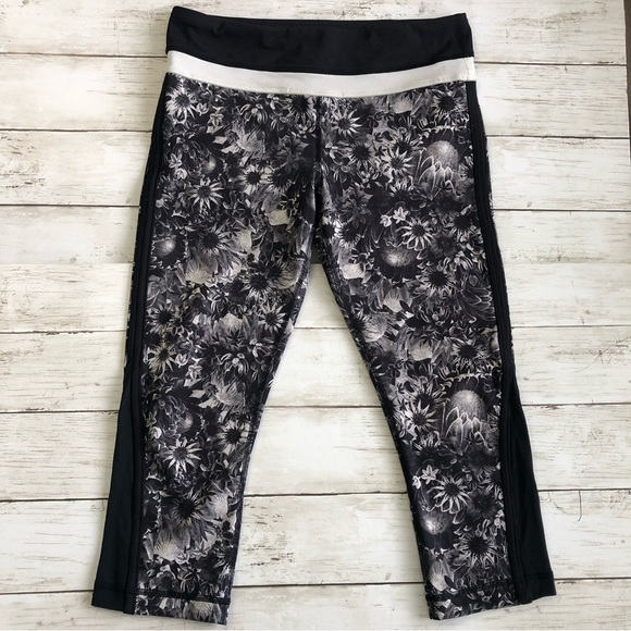 lululemon athletica Pants - LULULEMON Up The Pace Flowabunga Black/White Sunflower Print Cropped Leg…